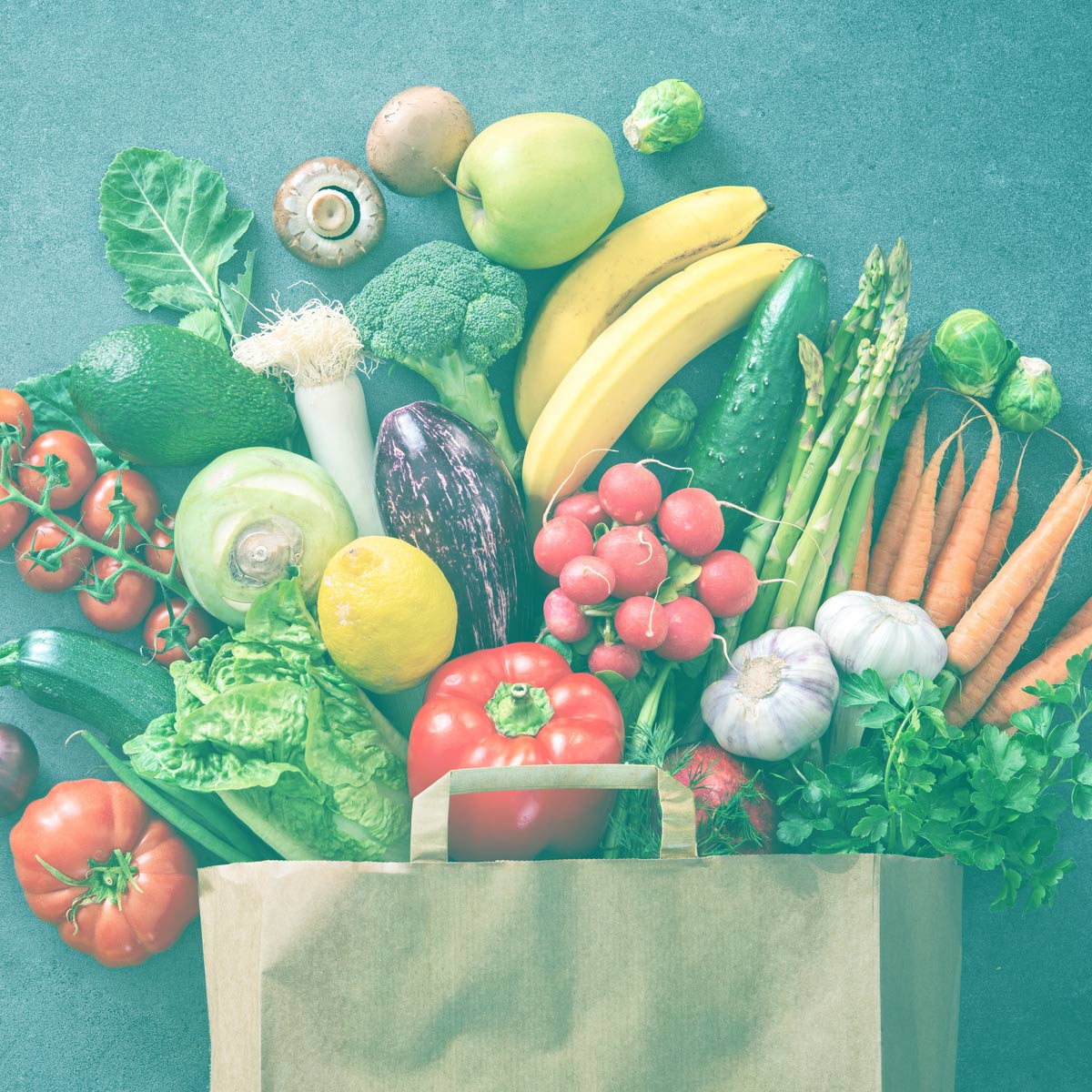 grocery bag with fruits and vegetables